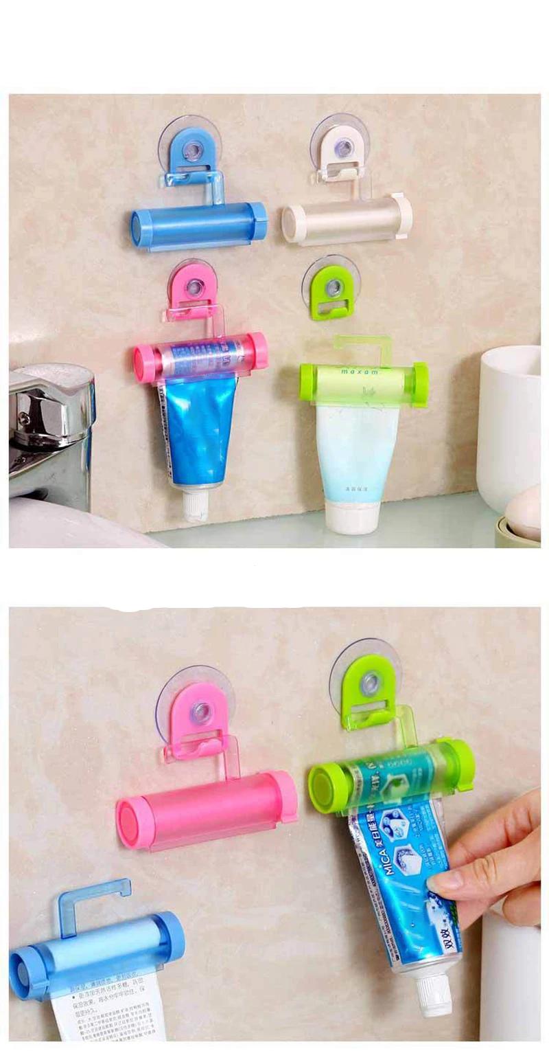 משחת שיניים Dispenser רולינג מסחטת מחזיק תליית וו יניקה פלסטיק צינור W משחת שיניים Dispenser רולינג מסחטת מחזיק תליית וו יניקה פלסטיק צינור W
