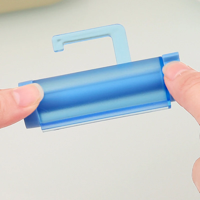 משחת שיניים Dispenser רולינג מסחטת מחזיק תליית וו יניקה פלסטיק צינור W משחת שיניים Dispenser רולינג מסחטת מחזיק תליית וו יניקה פלסטיק צינור W