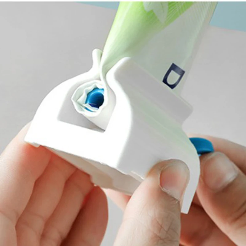 בית משחת שיניים Dispenser מסחטת אביזרי אמבטיה משחת שיניים מחזיק ארגונית צבע לשיער קוסמטי Creative מסחטת אין פסולת
