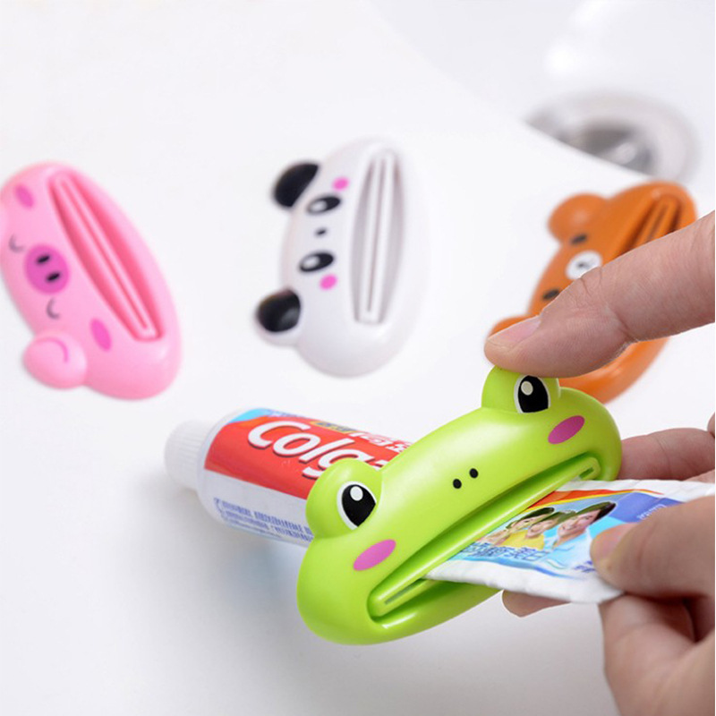 בית משחת שיניים Dispenser מסחטת אביזרי אמבטיה משחת שיניים מחזיק ארגונית צבע לשיער קוסמטי Creative מסחטת אין פסולת