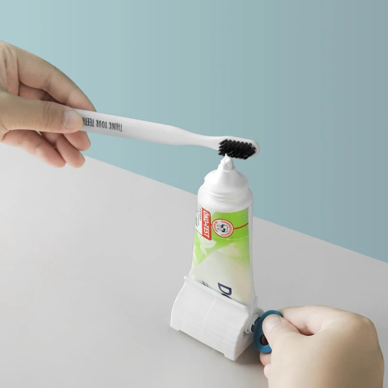 בית משחת שיניים Dispenser מסחטת אביזרי אמבטיה משחת שיניים מחזיק ארגונית צבע לשיער קוסמטי Creative מסחטת אין פסולת